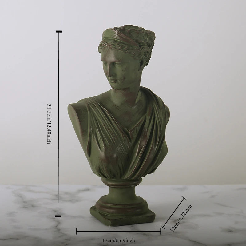 Esculturas decorativas de bustos de figuras da mitologia grega